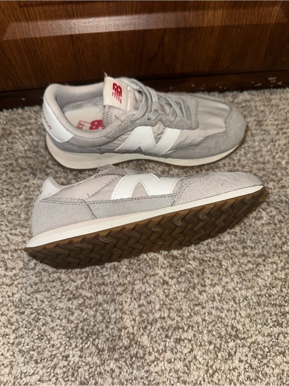 New Balance 237 sneakers in gray and white